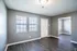Living area with wood-style floors and an open doorway at Jackson Heights Residential in West Memphis, AR