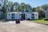 Two-story apartment building and parking lot at Meadow Creek Apartments in Jackson, MS