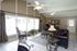 Bright clubhouse seating area at Meadow Creek Apartments in Jackson, MS
