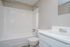 Townhome bathroom with tub and vanity at Meadow Creek Apartments in Jackson, MS