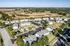 Aerial view of the community and surrounding area at Meadows West Memphis Apartments in West Memphis, AR