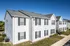 Residential building with shuttered windows at Meadows West Memphis Apartments in West Memphis, AR
