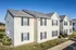 Building exterior with outdoor stairways at Meadows West Memphis Apartments in West Memphis, AR