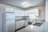 Kitchen with white cabinets in a 3-bedroom unit at Meadows West Memphis Apartments in West Memphis, AR