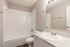 Bathroom with tub-shower combo and vanity at Pines Apartments in Jackson, MS