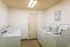 Laundry room with washers and dryers at Windsor Place Apartments in Memphis, TN