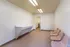 Laundry room folding counter and seating at Windsor Place Apartments in Memphis, TN