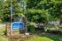 Community sign beside the street entrance at The Meadows Apartments in Memphis, TN