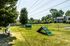 Fenced dog park with agility equipment at The Meadows Apartments in Memphis, TN