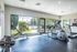 Fitness center with cardio machines and free weights at The Meadows Apartments in Memphis, TN