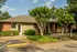 Leasing office with landscaped walkway and parking at Hickory Pointe in Memphis, TN