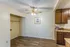 Dining area with a ceiling fan and wood cabinets at Hickory Pointe in Memphis, TN
