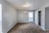 Carpeted one-bedroom bedroom at Deerfield Apartments in Memphis, TN