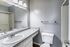Two-bedroom bathroom with vanity and mirror at Deerfield Apartments in Memphis, TN