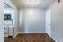 Living room with view into the kitchen at Deerfield Apartments in Memphis, TN