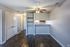 Dining area with ceiling fan and built-in shelves at Collier Village Apartments in Collierville, TN