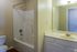 Bathroom with tub and vanity at Countryside Village in Memphis, TN