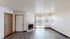 Living room with fireplace and patio door at Hickory Forest in Memphis, TN