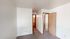 Bedroom with carpet and two doors at Hickory Forest in Memphis, TN