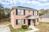 Brick townhouse with a covered front entry at Jackson Heights Residential in West Memphis, AR