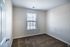 Second bedroom with natural light in a 3-bedroom at Meadows West Memphis Apartments in West Memphis, AR