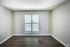 Bright bedroom with large window in 1 bedroom apartment at The Meadows Apartments in Memphis, TN
