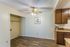 Dining area with a ceiling fan and wood cabinets at Hickory Pointe in Memphis, TN