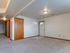 Lower Level Living Room and Entrance Door