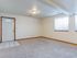 Lower Level Living Room and Entrance Door
