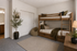 Cozy bedroom with stylish bunk beds, a large closet, and modern decor perfect for relaxation and comfort.