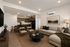 Chic open-plan living space featuring a modern kitchen, cozy dining area, and elegant living room with stylish decor.