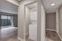 White stackable washer and dryer.