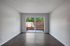 Large sliding glass door leading to private patio