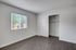 Large bedroom with updated flooring
