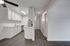 Updated kitchen with new appliances and white shaker cabinets