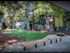 Nicely landscaped area with two benches