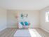 2 bedroom decorated living room with vinyl planking
