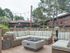 lounge area by office with firepit.