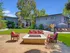 Fire Pit and Lounge Chairs to enjoy the Beautiful Garden Scenery
