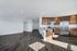 Renovated kitchen and living area with natural light