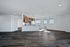 Renovated kitchen and living area with natural light