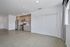 Kitchen and living area with polished concrete flooring