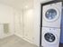 Bathroom in stacked washer and dryer