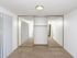 bedroom with mirror door closet