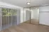 bedroom with mirror door closet and patio