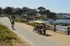 trail along the ocean cliff with bicyclists