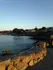 view of the bay with stairs leading to water
