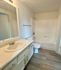 Bathroom with bathtub and shower