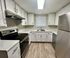 Updated kitchen with stainless steel appliances