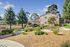 Beautifully landscaped grounds with meandering pathways through the community.